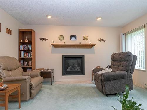 3597 Arbutus Dr North, Cobble Hill, BC - Indoor Photo Showing Living Room With Fireplace