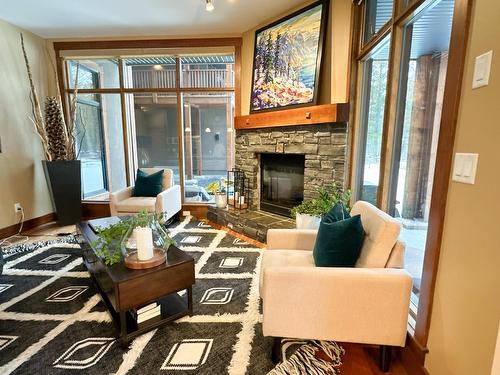 108 - 880 Lakeview Drive, Windermere, BC - Indoor Photo Showing Living Room With Fireplace