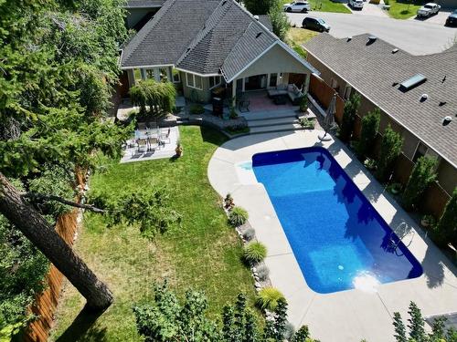 858 Woodhaven Place, Kelowna, BC - Outdoor With In Ground Pool With Deck Patio Veranda