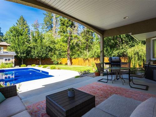 858 Woodhaven Place, Kelowna, BC - Outdoor With In Ground Pool With Deck Patio Veranda With Exterior