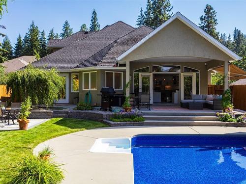 858 Woodhaven Place, Kelowna, BC - Outdoor With In Ground Pool With Deck Patio Veranda