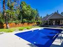 858 Woodhaven Place, Kelowna, BC  - Outdoor With In Ground Pool With Deck Patio Veranda With Backyard 