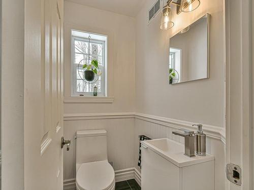 Powder room - 20 Ch. Des Fleurs-Sauvages, Mont-Tremblant, QC - Indoor Photo Showing Bathroom