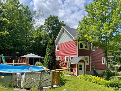 Cour - 20 Ch. Des Fleurs-Sauvages, Mont-Tremblant, QC - Outdoor With Above Ground Pool