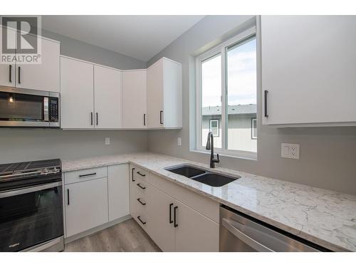 2508 Shuswap Avenue Unit# 9, Lumby, BC - Indoor Photo Showing Kitchen With Double Sink