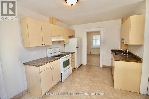 12039 Steeles Ave, Halton Hills, ON - Indoor Photo Showing Kitchen With Double Sink
