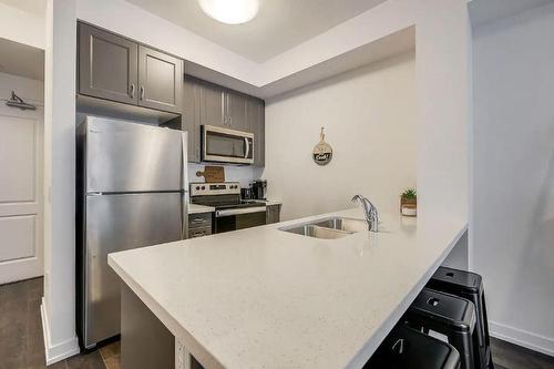 5055 Greenlane Road|Unit #229, Beamsville, ON - Indoor Photo Showing Kitchen With Double Sink