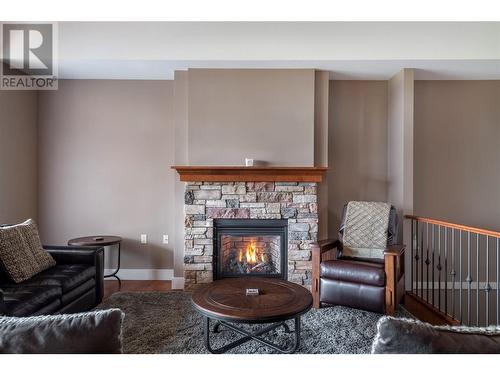 179 Longspoon Drive, Vernon, BC - Indoor Photo Showing Living Room With Fireplace