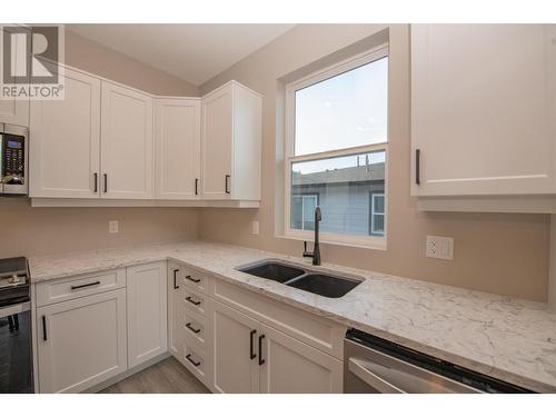 2508 Shuswap Avenue Unit# 17, Lumby, BC - Indoor Photo Showing Kitchen With Double Sink