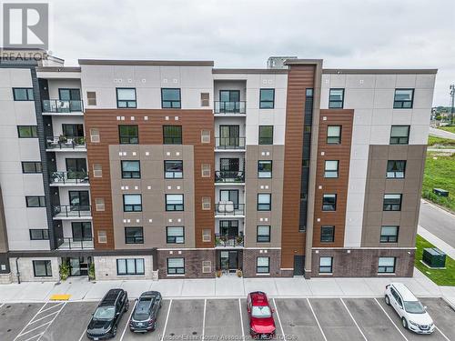 728 Brownstone Drive Unit# 409, Lakeshore, ON - Outdoor With Balcony With Facade
