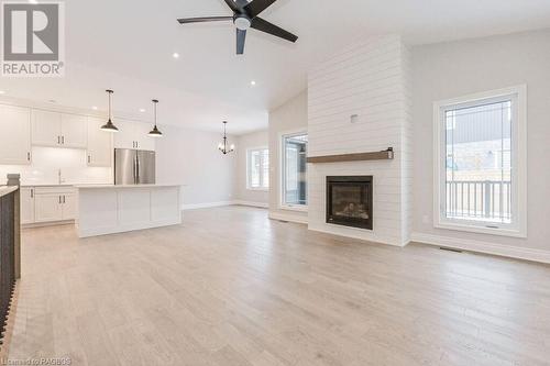 105 Dougs Crescent, Mount Forest, ON - Indoor With Fireplace