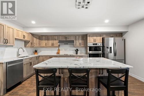 107 Countrycharm Dr, Belleville, ON - Indoor Photo Showing Kitchen With Upgraded Kitchen