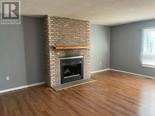 76 Willerton Clse, Brampton, ON - Indoor Photo Showing Living Room With Fireplace