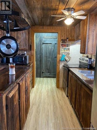 419 Goulette Point Road, Charlo, NB - Indoor Photo Showing Kitchen With Double Sink