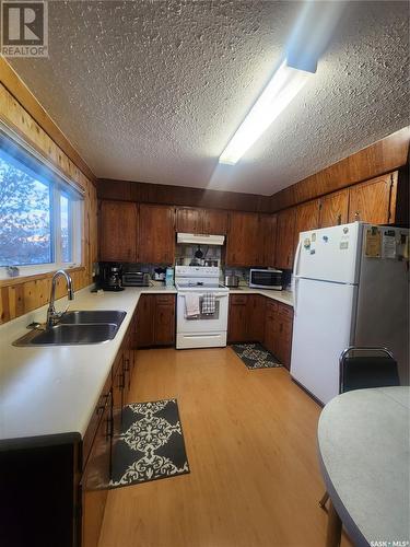 1977 14Th Street W, Prince Albert, SK - Indoor Photo Showing Kitchen With Double Sink