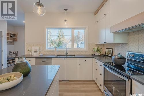 803B 2Nd Street E, Saskatoon, SK - Indoor Photo Showing Kitchen With Stainless Steel Kitchen With Double Sink