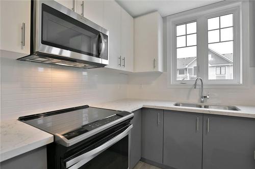 288 Glover Road|Unit #32, Stoney Creek, ON - Indoor Photo Showing Kitchen With Double Sink