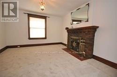 24 Ash Cres, Toronto, ON - Indoor Photo Showing Other Room With Fireplace