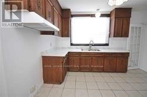 24 Ash Cres, Toronto, ON - Indoor Photo Showing Kitchen With Double Sink