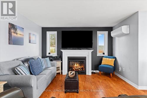 541G South Shore Rd, Greater Napanee, ON - Indoor Photo Showing Living Room With Fireplace