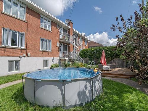 Backyard - 784  - 786 Rue Albert, Laval (Chomedey), QC - Outdoor With Above Ground Pool With Exterior