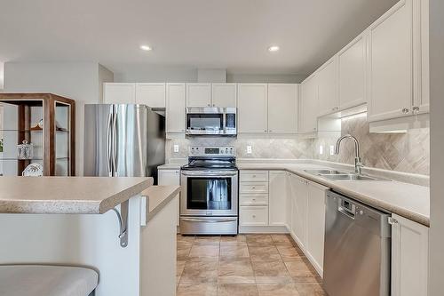 399 Elizabeth Street|Unit #411, Burlington, ON - Indoor Photo Showing Kitchen With Double Sink