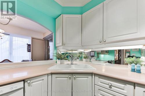 334 - 1300 Marlborough Court, Oakville, ON - Indoor Photo Showing Kitchen With Double Sink