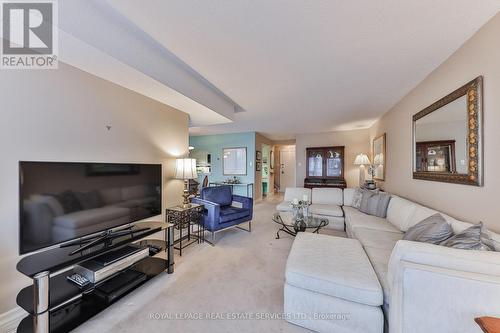 334 - 1300 Marlborough Court, Oakville, ON - Indoor Photo Showing Living Room