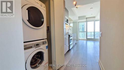 3602 - 290 Adelaide Street W, Toronto, ON - Indoor Photo Showing Laundry Room