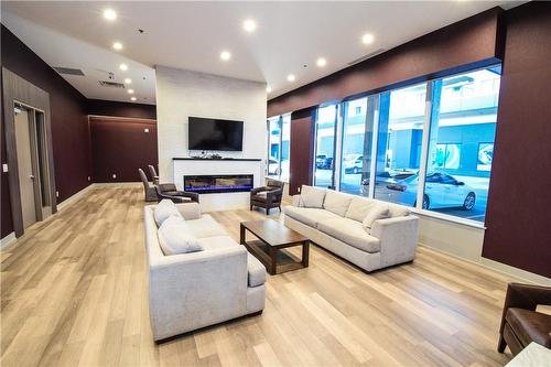 560 North Service Road|Unit #506, Grimsby, ON - Indoor Photo Showing Living Room With Fireplace