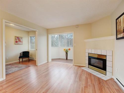 307-2900 Orillia St, Saanich, BC - Indoor Photo Showing Living Room With Fireplace