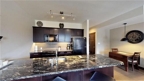 715 D - 700 Bighorn Boulevard, Radium Hot Springs, BC - Indoor Photo Showing Kitchen With Double Sink With Upgraded Kitchen