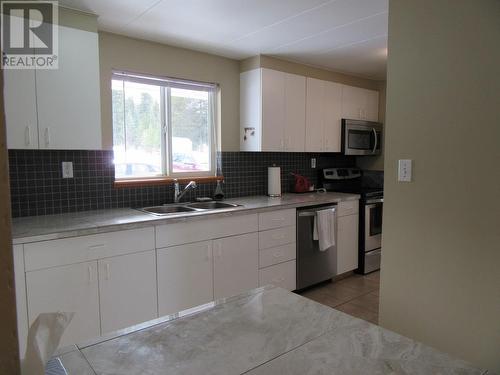 6497 Monette Road, Horse Lake, BC - Indoor Photo Showing Kitchen With Double Sink