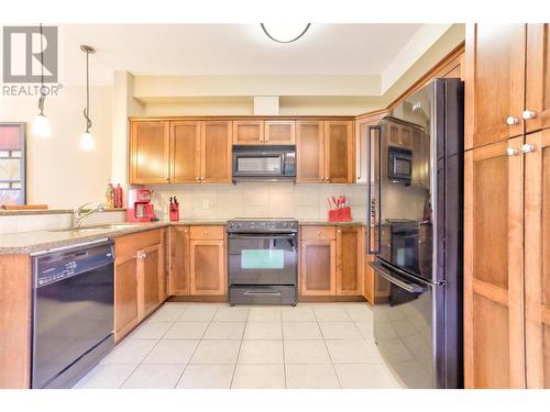 3996 Beach Avenue Unit# 221, Peachland, BC - Indoor Photo Showing Kitchen With Double Sink