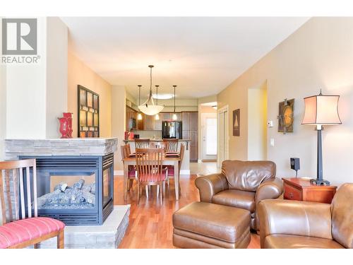 3996 Beach Avenue Unit# 221, Peachland, BC - Indoor Photo Showing Living Room With Fireplace