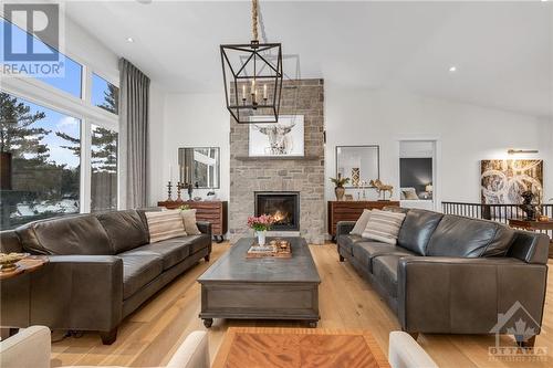 1645A Calabogie Road, Burnstown, ON - Indoor Photo Showing Living Room With Fireplace