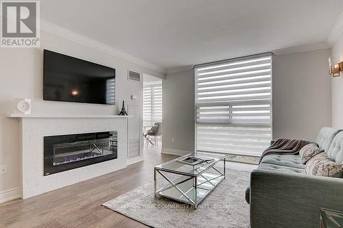 #1111 -20 Harding Blvd W, Richmond Hill, ON - Indoor Photo Showing Living Room With Fireplace