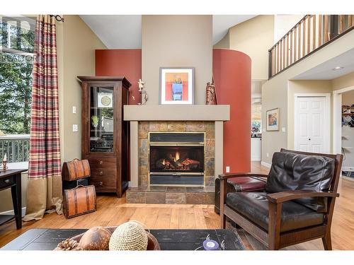 9283 Chinook Road, Vernon, BC - Indoor Photo Showing Living Room With Fireplace