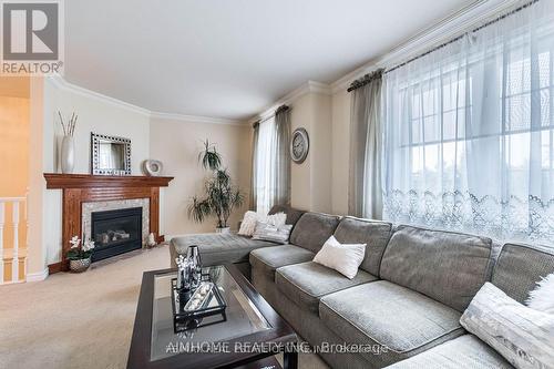 64 Raspberry Trail, Thorold, ON - Indoor Photo Showing Living Room With Fireplace