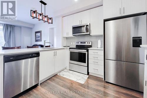 #212 -320 Plains Rd E, Burlington, ON - Indoor Photo Showing Kitchen With Stainless Steel Kitchen