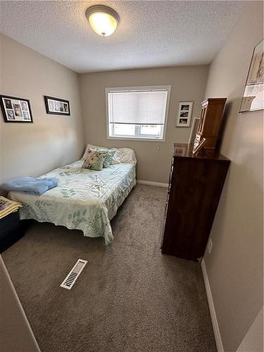 1202 4Th Street, Brandon, MB - Indoor Photo Showing Bedroom
