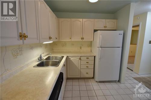 16 Lambert Lane, Perth, ON - Indoor Photo Showing Kitchen With Double Sink