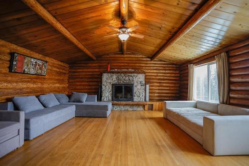 6675 Highway 3A, Nelson, BC - Indoor Photo Showing Living Room With Fireplace