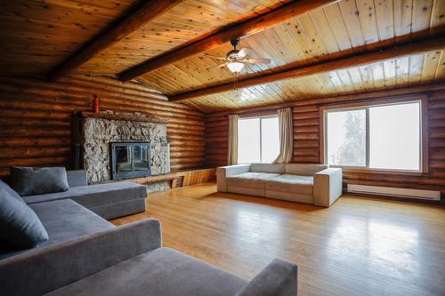 6675 Highway 3A, Nelson, BC - Indoor Photo Showing Living Room With Fireplace