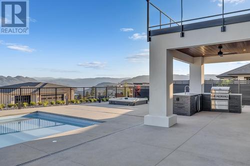1523 Cabernet Way, Kelowna, BC - Outdoor With In Ground Pool
