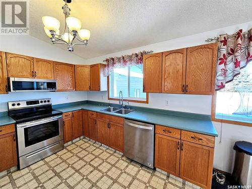 11 Arcola Place, Carlyle, SK - Indoor Photo Showing Kitchen With Double Sink