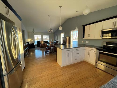 1 416 Currie Road N, Swan River, MB - Indoor Photo Showing Kitchen