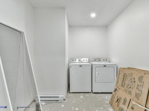 Salle d'eau - 141 Rue Wilson, Mont-Blanc, QC - Indoor Photo Showing Laundry Room