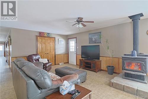 204 Ashland Road, Ashland, NB - Indoor Photo Showing Living Room With Fireplace