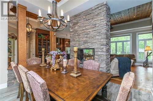 2868 Bouvier Road, Clarence-Rockland, ON - Indoor Photo Showing Dining Room With Fireplace